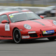 Roter Porsche mit Speed beim Porsche Sports Cup 2014 auf dem Nürburgring